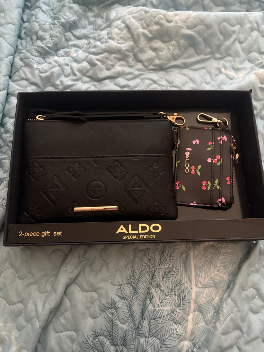 ALDO Womenβs Black Embossed Wristlet & Floral Cardholder Set